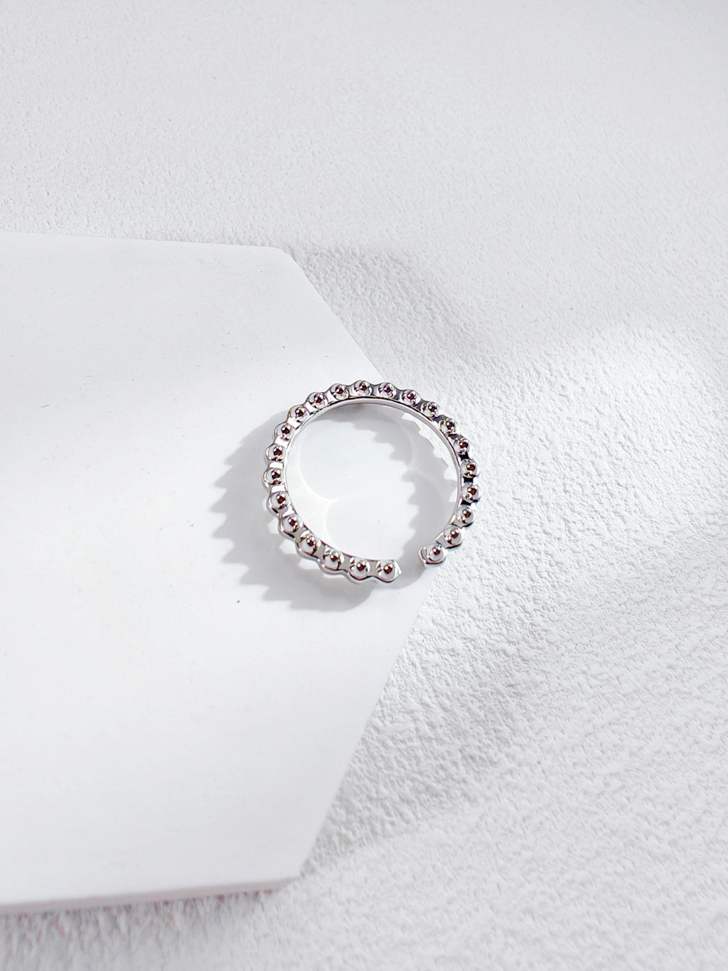Rivet bullet shaped ring