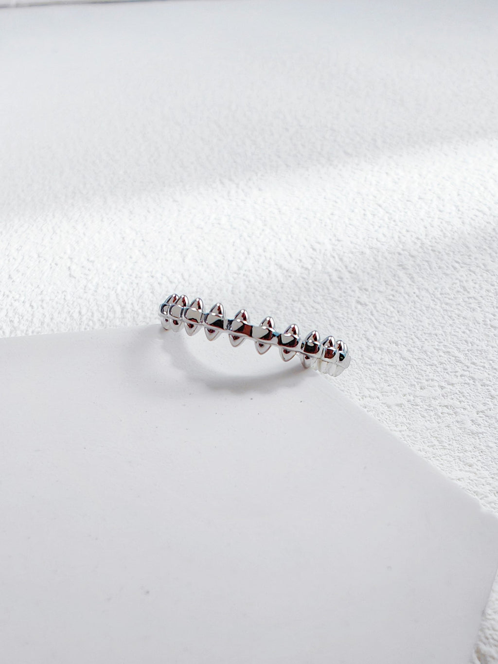 Rivet bullet shaped ring