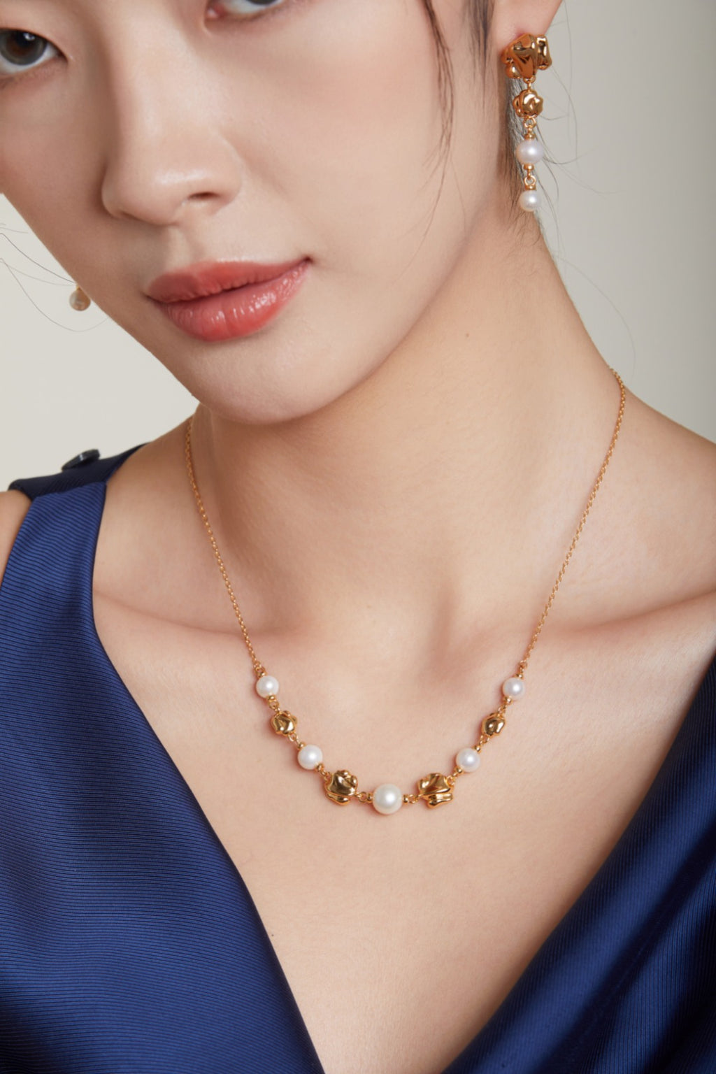Golden Charm Pearl Necklace